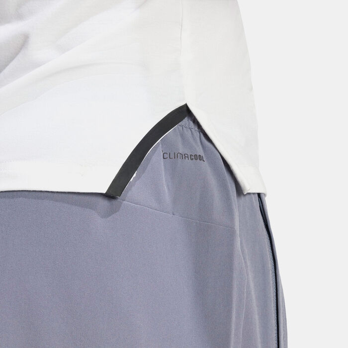 اديداس بنطال التمرين ترين إسينشالز بطول 3/4 للرجال أسود image number 4